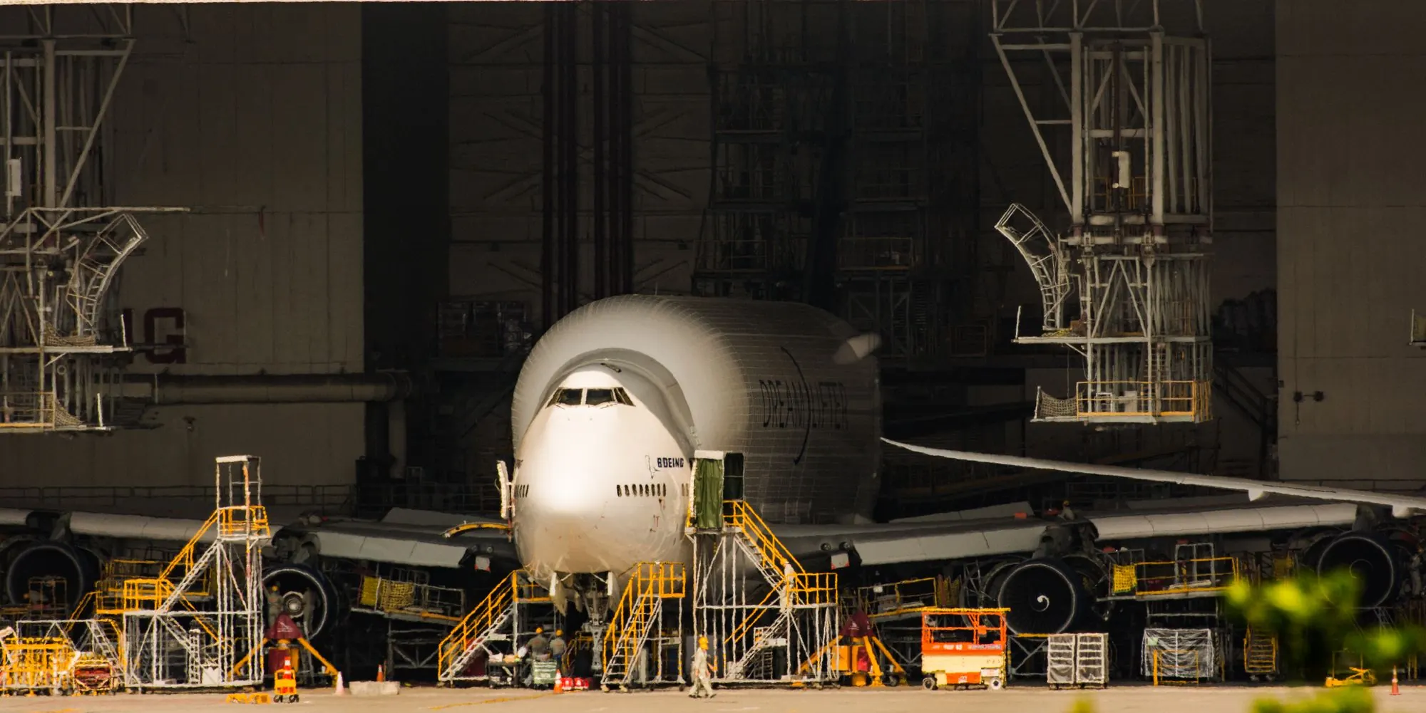 Aircraft in a hangar at night